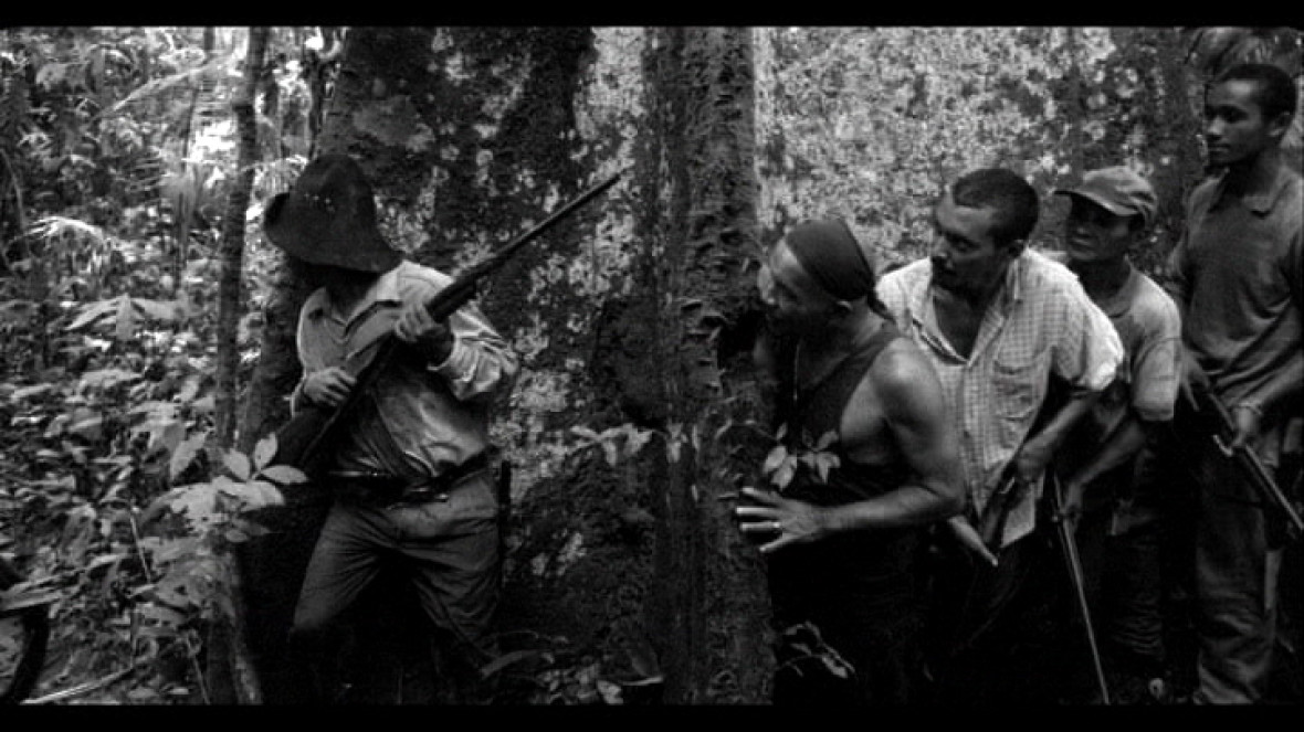 Group of young men with guns in the Amazonas